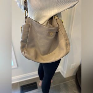 Prada “Side Pocket Zip Hobo Vitello Daino Large”